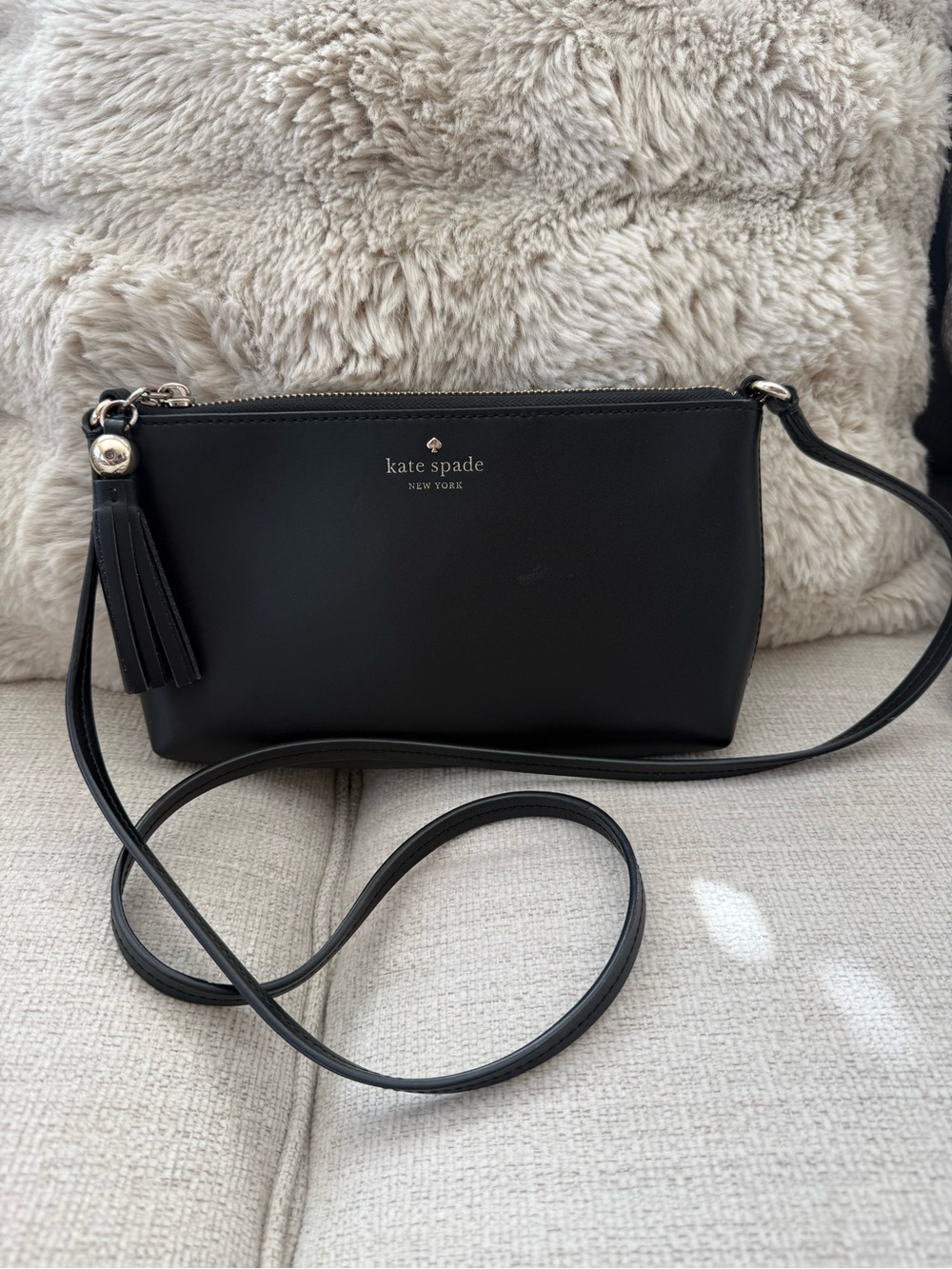 kate spade Black Leather Crossbody with Tassel Charm